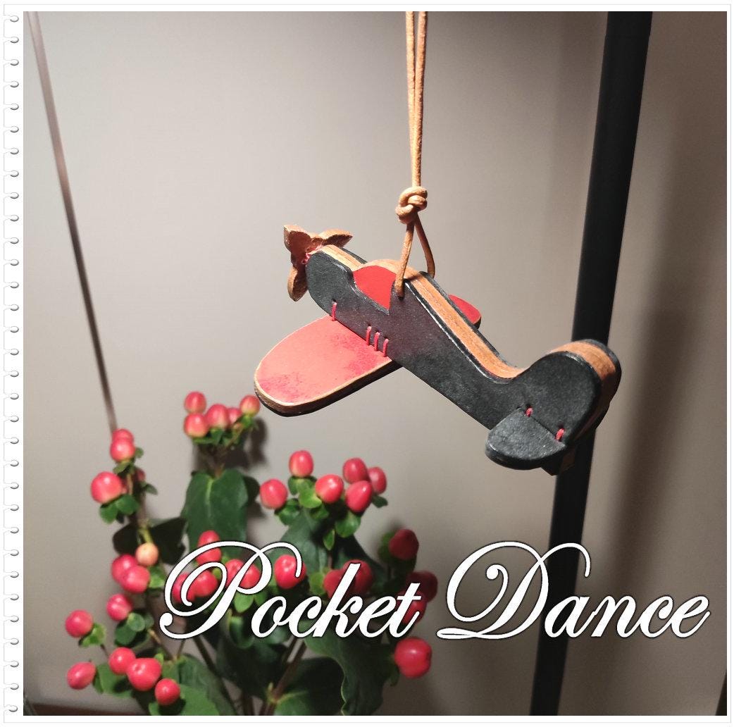 Handmade Leather Airplane Toy: Unique Red Aircraft Gift